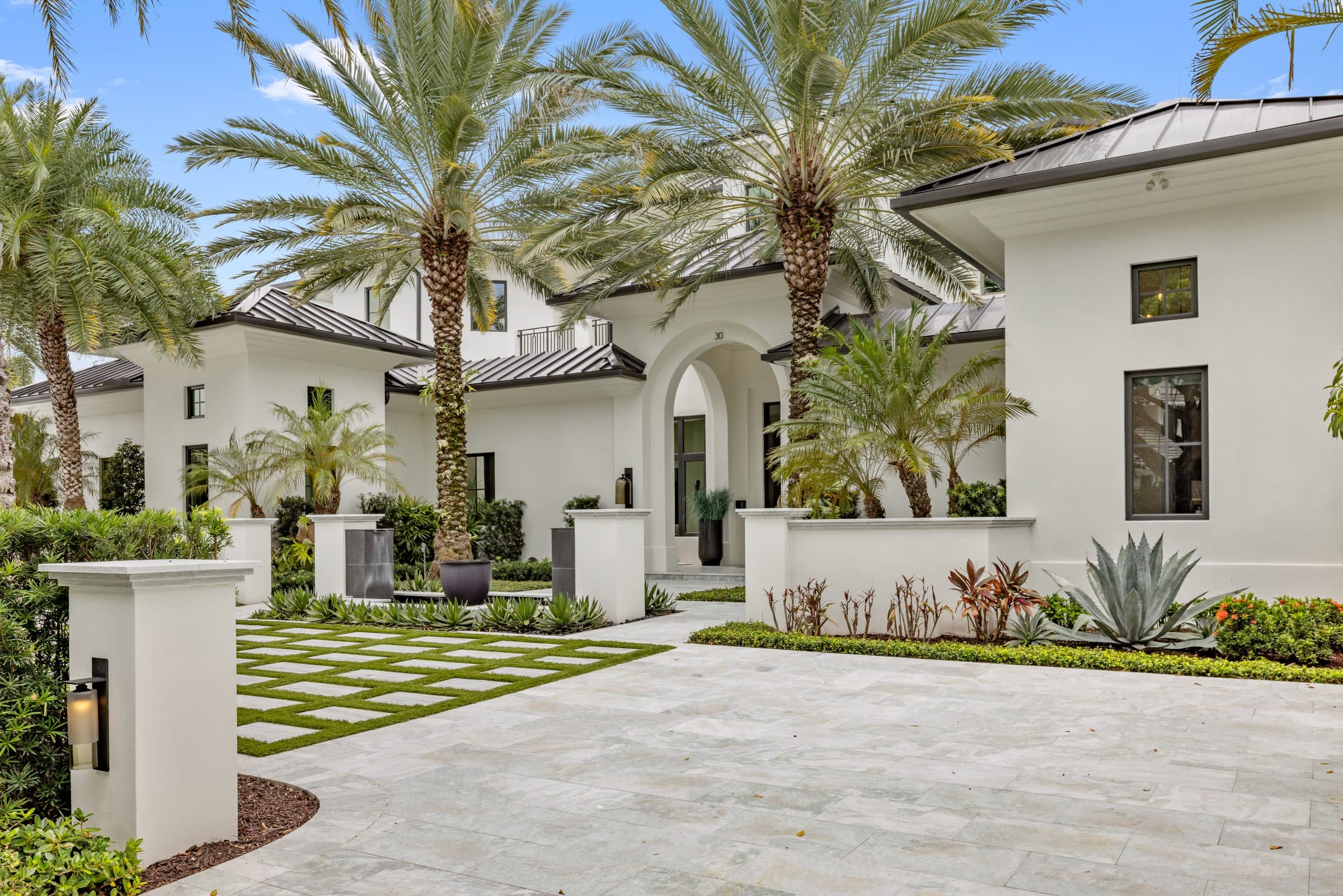 Aerial view of a row of luxury residences within a gated Florida community