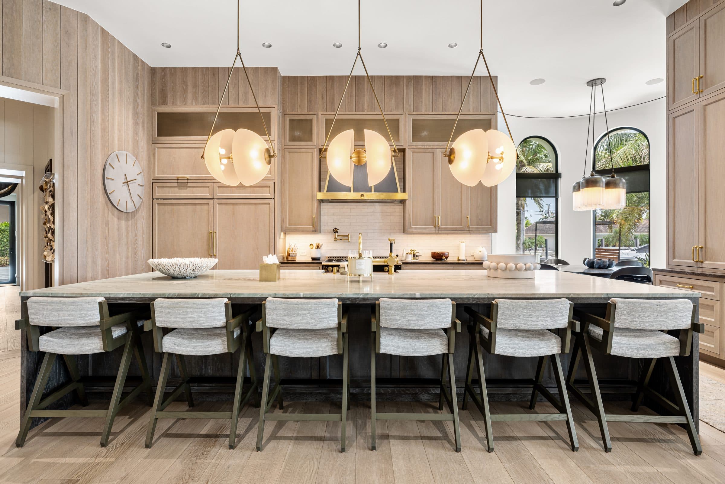 Kitchen island with pendant lighting and bar seating